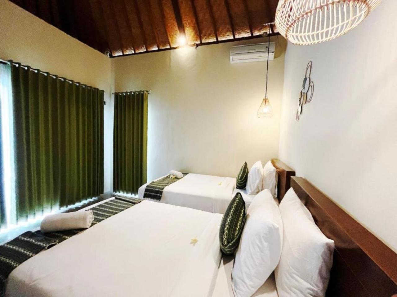 Wk Gamat Garden Hotel Toyapakeh Buitenkant foto